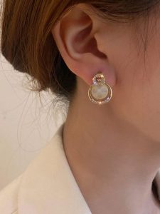 Embrace minimalistic chic with Circular Earrings - timeless designs in circular motifs, effortlessly complementing any outfit, for a stylish finishing touch to your daily look.