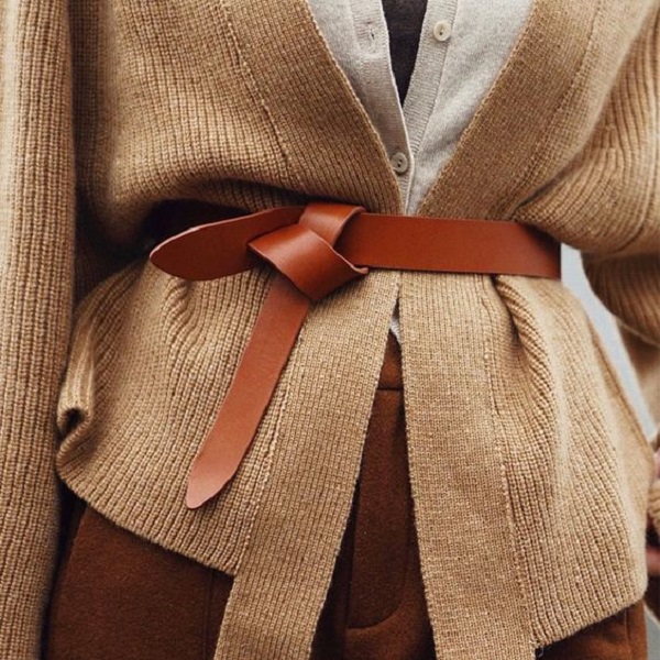 A wrap belt cinches the waist